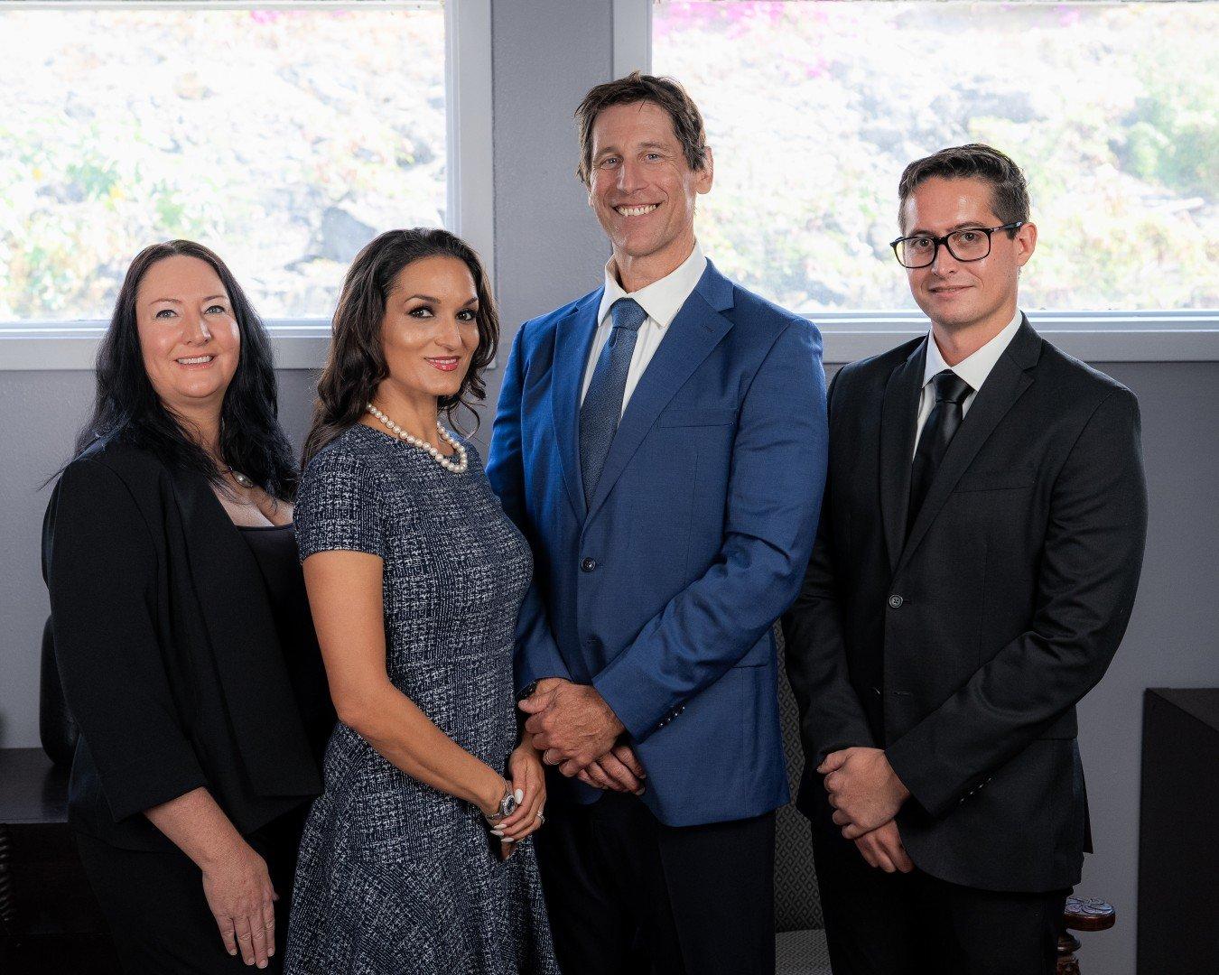 Foster Law Offices team: Jeff Foster, Kupala Foster, and staff